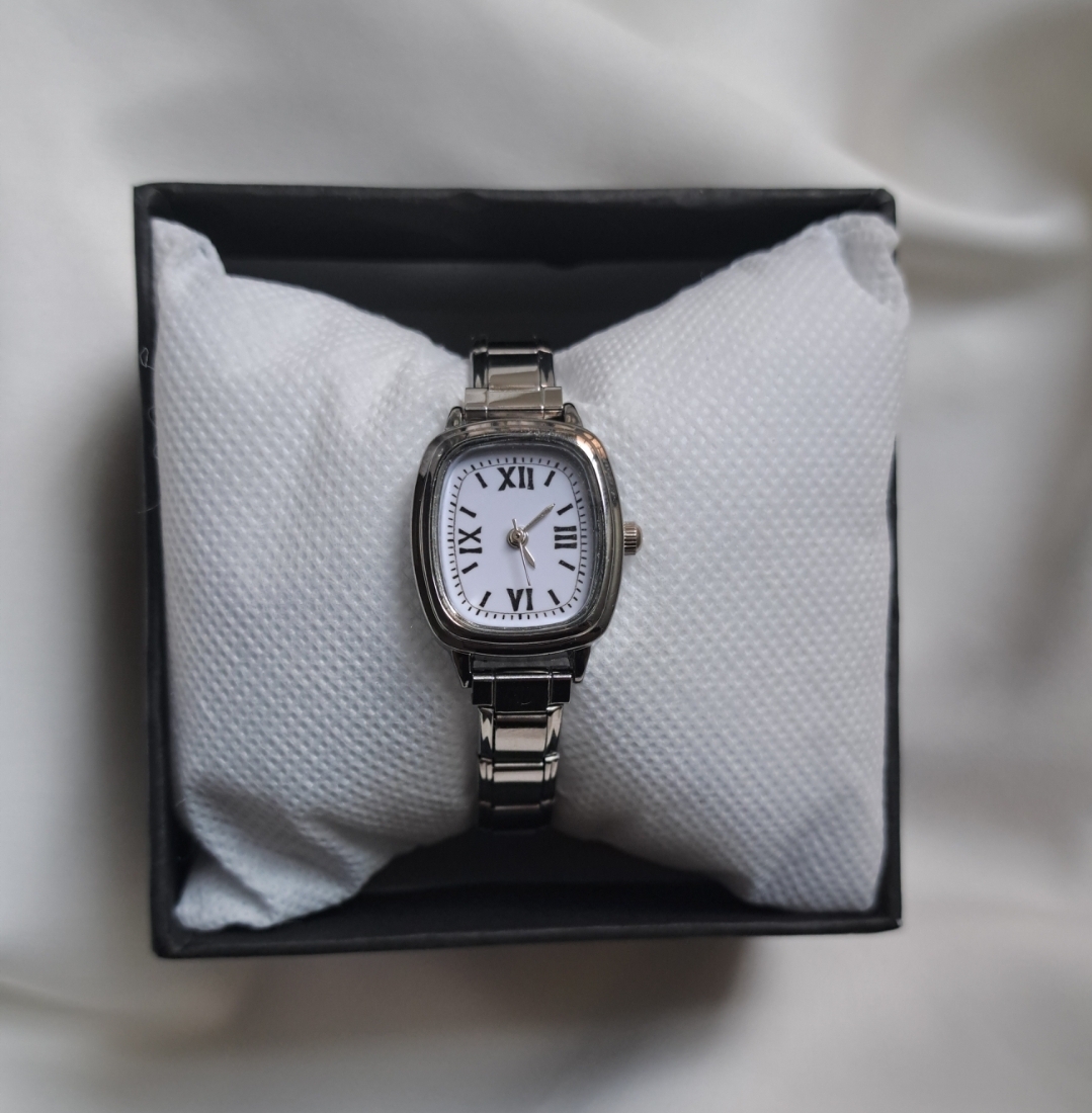 ساعت مچی چارم خور استیل صفحه سفید یونانی